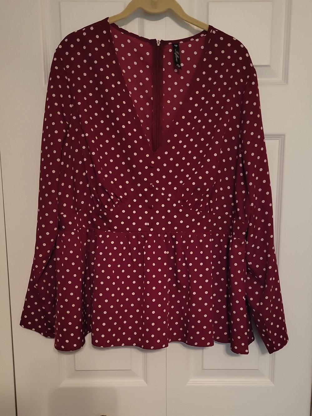 Polka Dot Peplum Long-Sleeve Top
